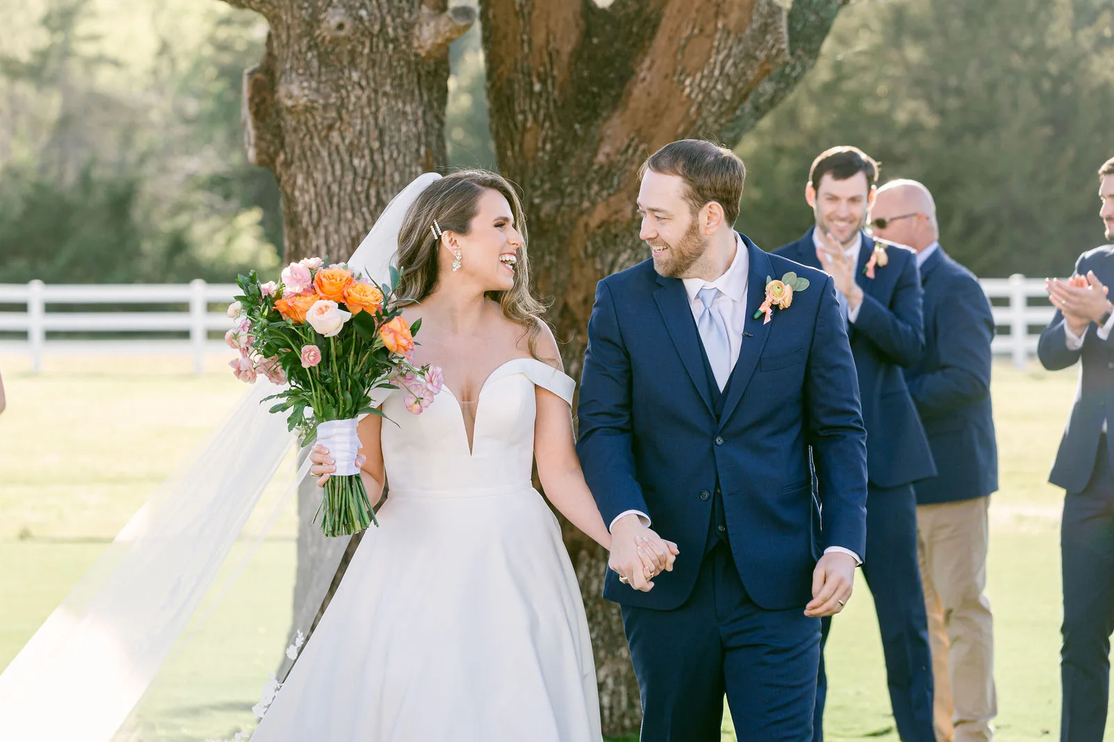 Guests seated for the outdoor ceremony at The French Farmhouse.