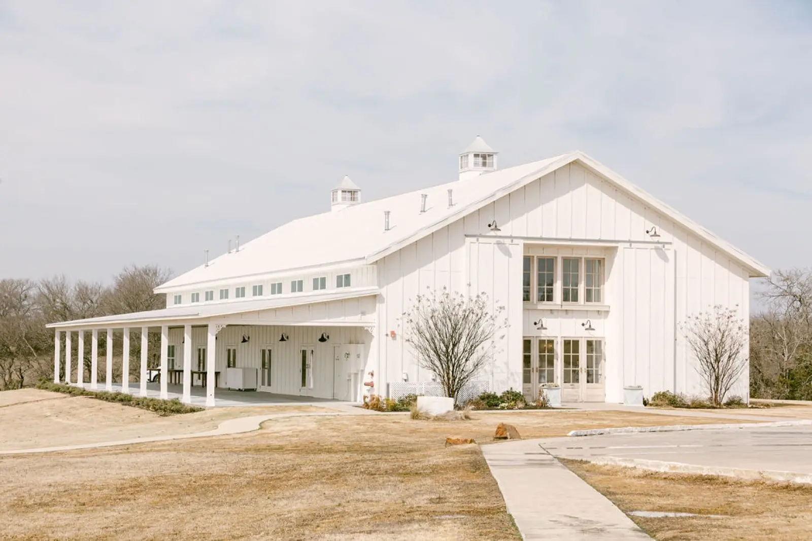 Exterior view of the barn reception space at The Grand Ivory.