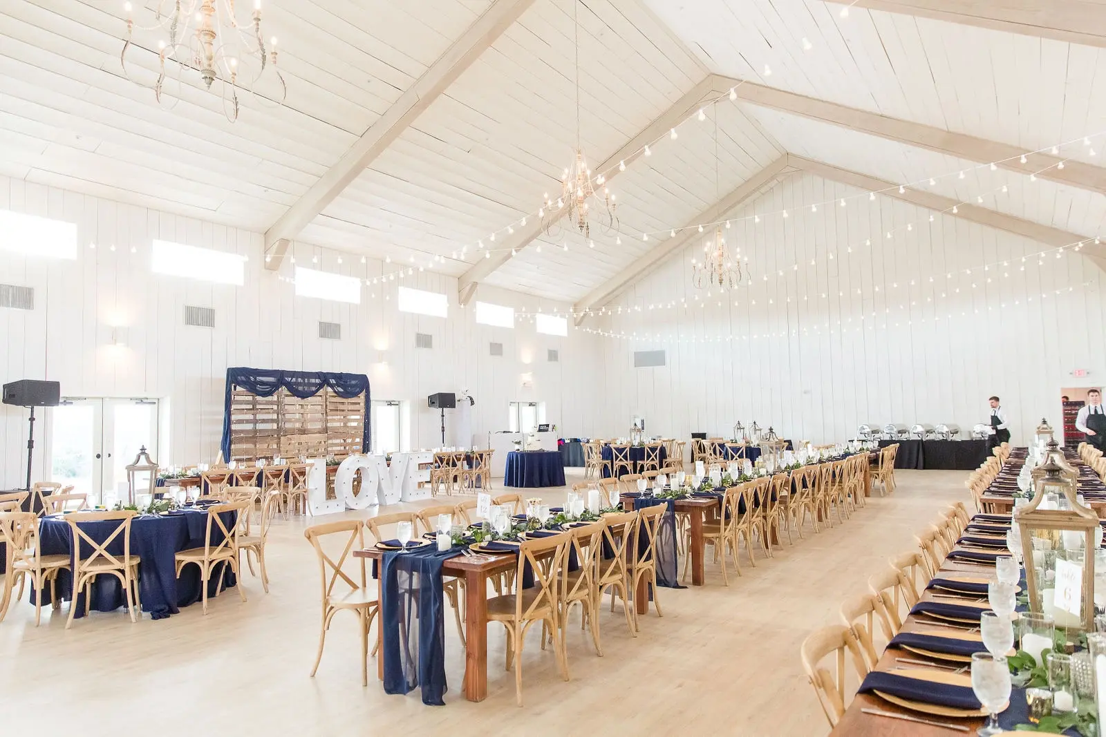 Reception room view inside the barn at The Grand Ivory.